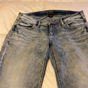 “Silver” designer blue faded jeans-see pics for color reference